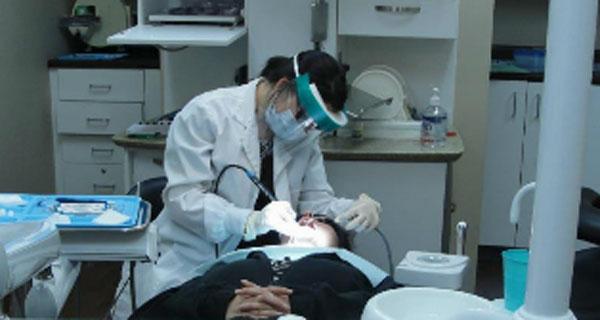 Dental Suite with hygenist and person